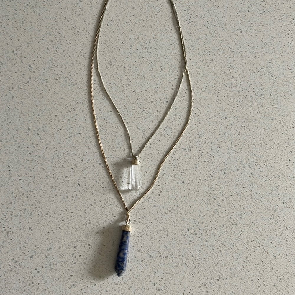 Layering crystal necklaces